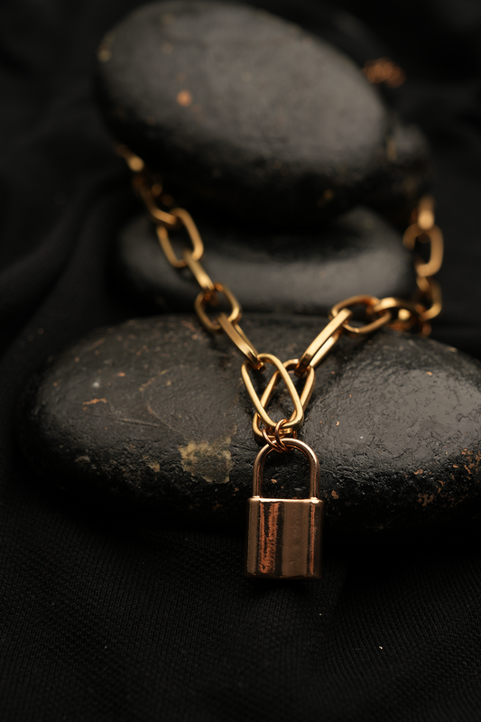 Golden lock charm necklace