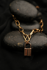Golden lock charm necklace