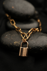 Golden lock charm necklace